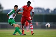 Victor Wanyama of Southampton duels for the ball against Barnils of UE Llagostera during a friendly match between Southampton FC and UE Llagostera at the Josep Pla i Arbones Stadium on July 17, 2013 in Girona, Spain. (Getty Images)